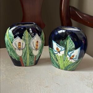 Pair of hand painted redware ceramic vases with calla lillies, cobalt blue glaze